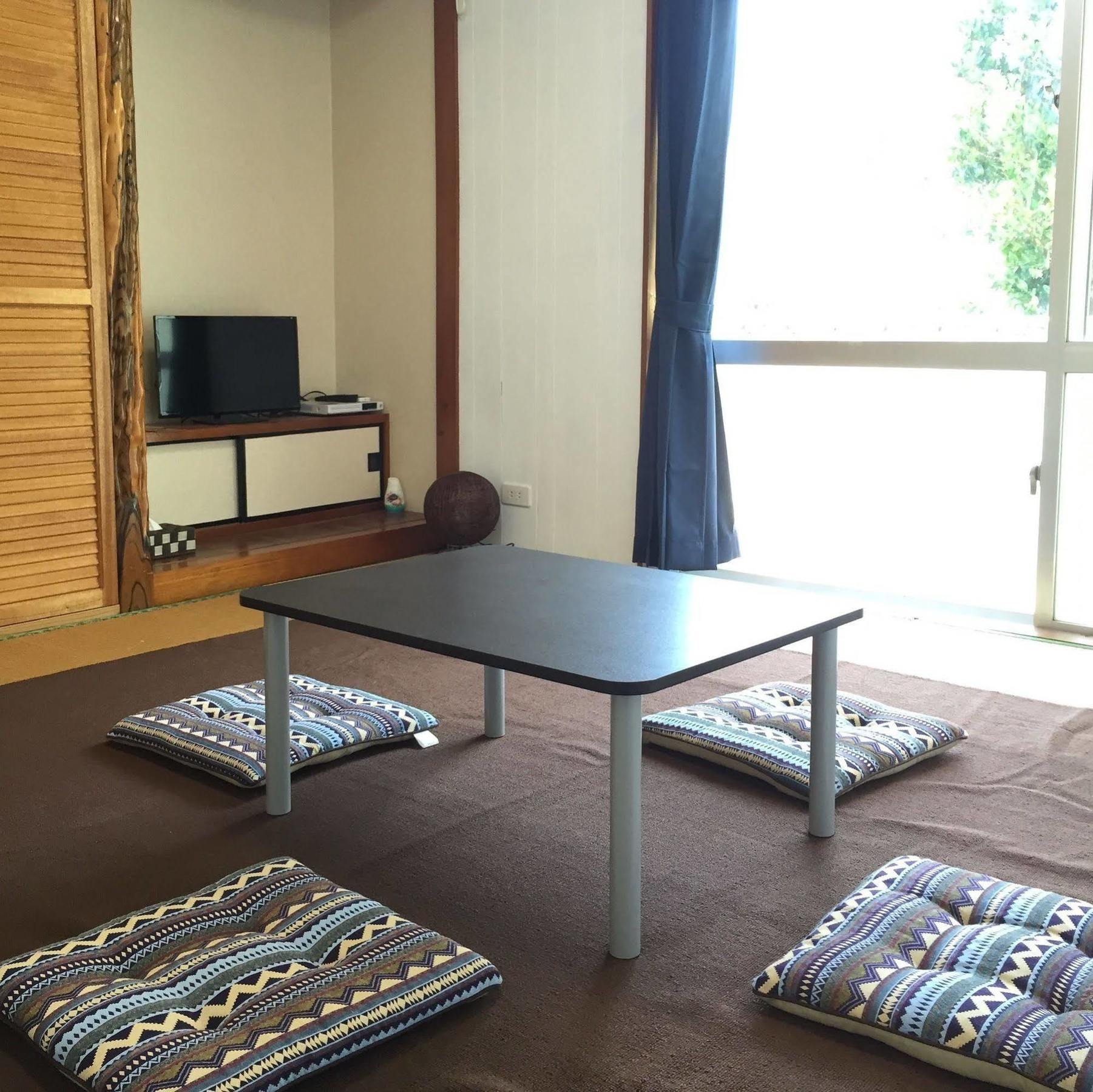 Guesthouse Seagull Village Motobu Exterior photo