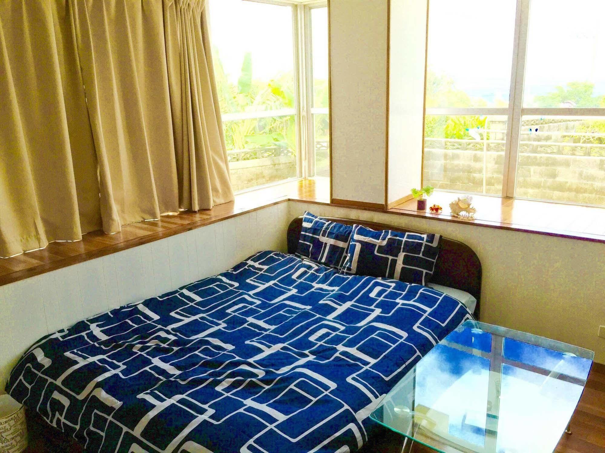 Guesthouse Seagull Village Motobu Exterior photo