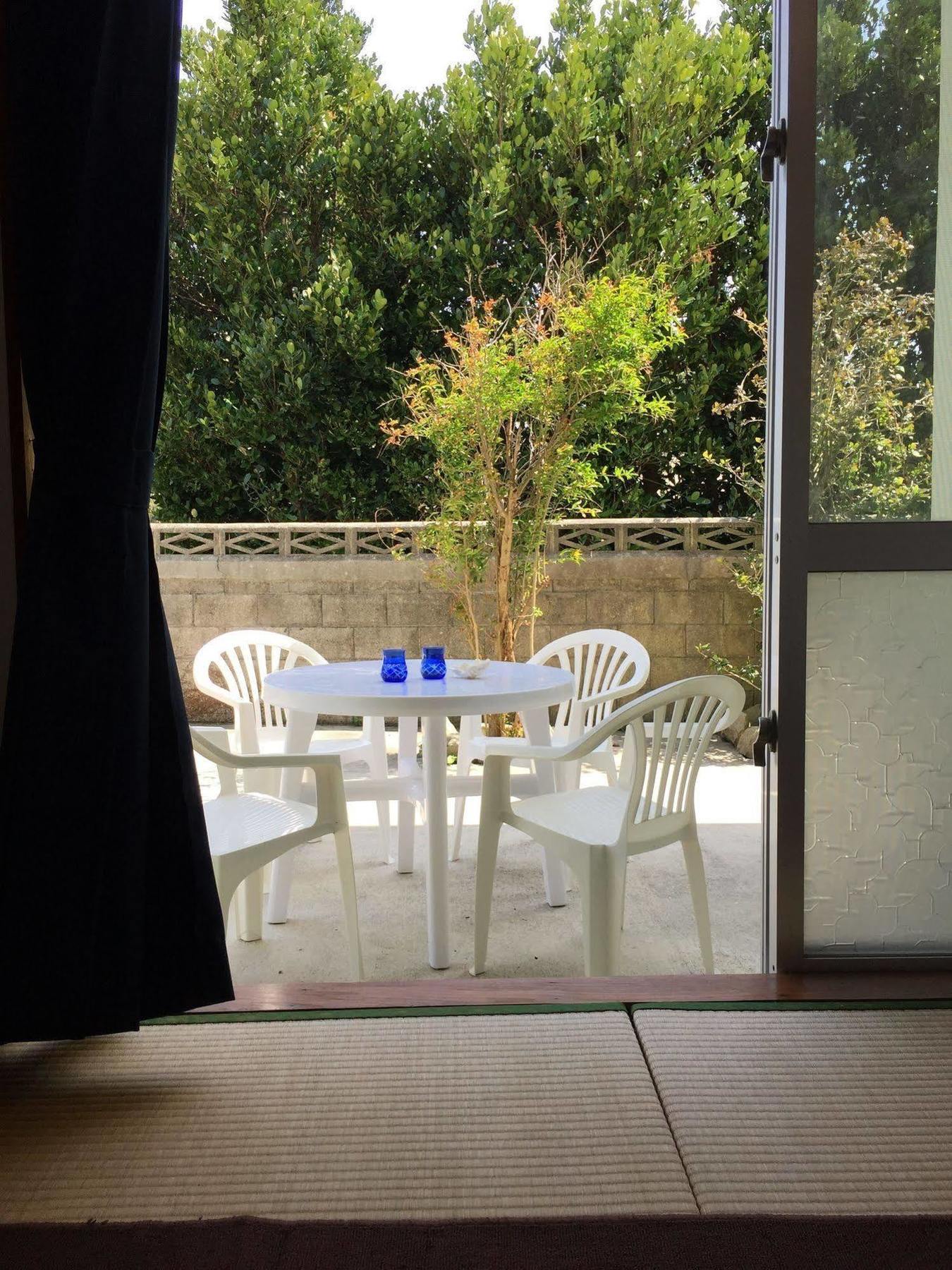 Guesthouse Seagull Village Motobu Exterior photo