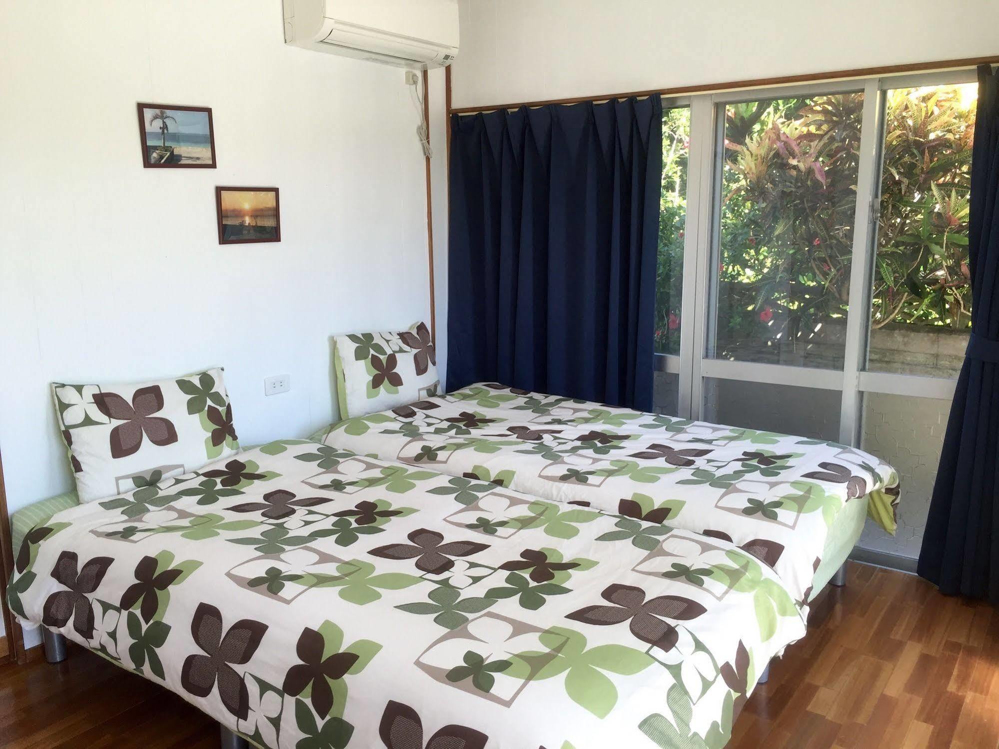 Guesthouse Seagull Village Motobu Exterior photo